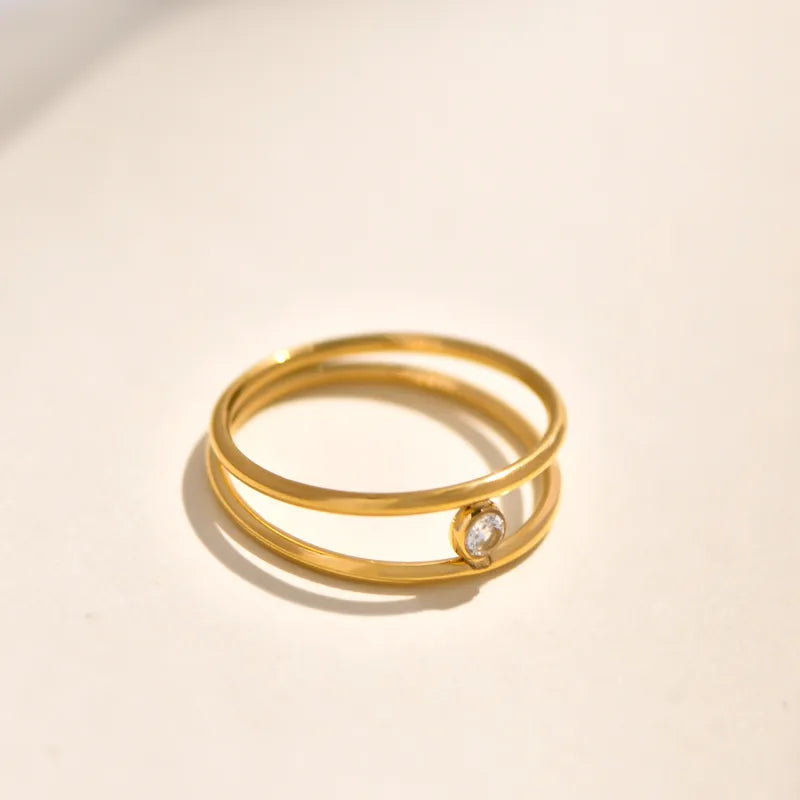 Double Layer Titanium Steel Gold Plated Ring With Large Embedded Diamonds And Butterfly Knot Irregular Geometry Crossed Square