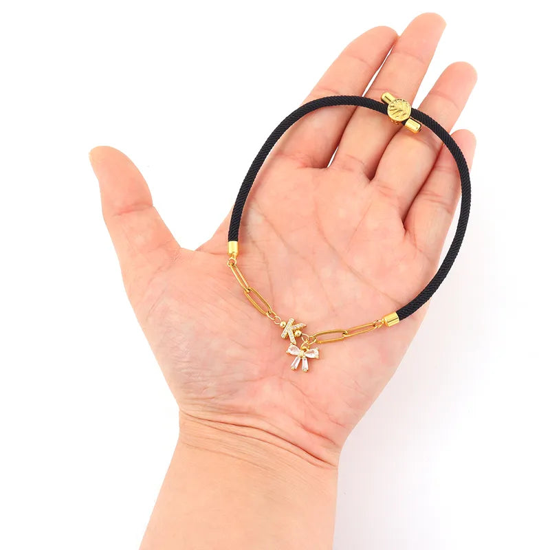 Minimalist Micro Pave Zirconia 18K Gold Plated Initial Bow Pendant Adjustable Women's Bracelet